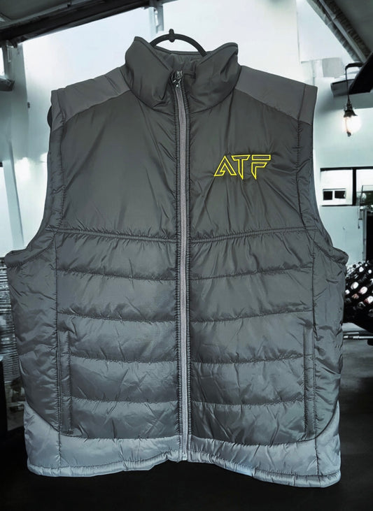 Stay warm without compromising on movement with the ATF Body Warmer.  Designed for athletes and gym-goers, this lightweight yet insulated vest provides the perfect balance of warmth and flexibility.