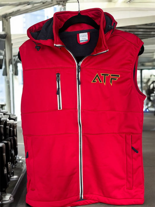 Stay warm without compromising on movement with the ATF Bodywarmer. Designed for athletes and gym-goers, this lightweight yet insulated vest provides the perfect balance of warmth and flexibility. Featuring a sleek design with ATF logo, it's ideal for layering your gym gear or wearing casually.